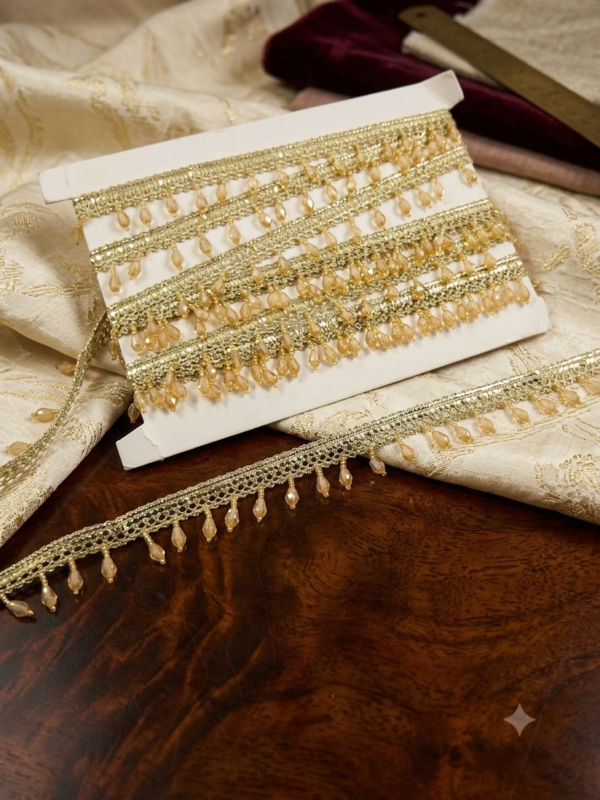 Light golden braided trim teardrop beads.