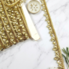golden brown sleek crystal teardrop stone lace