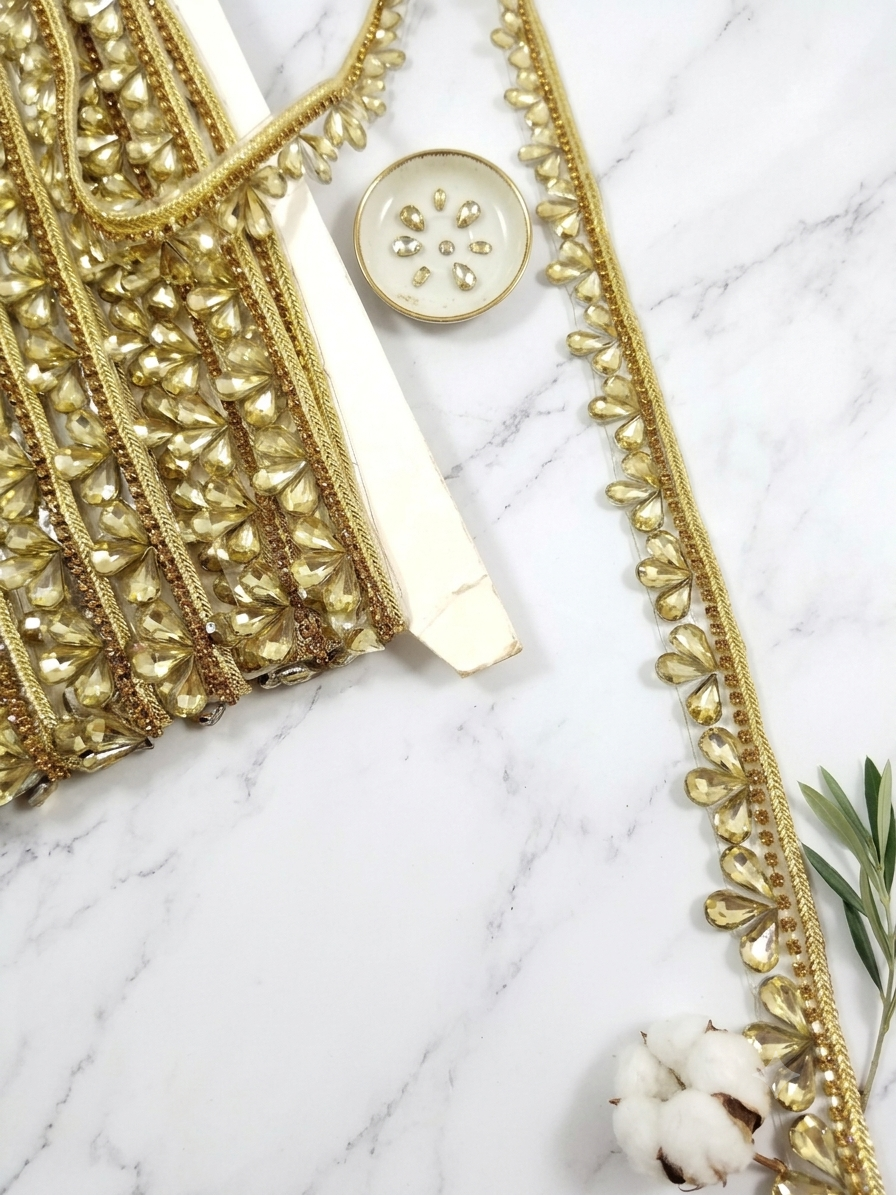 golden brown sleek crystal teardrop stone lace