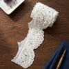 Fancy white scalped cutwork scallop lace