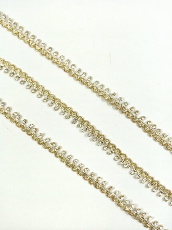 Metallic gold (double shaded) lace trim with rhinestones.