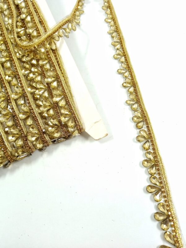 golden brown sleek crystal teardrop stone lace