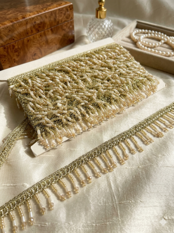 image_a6d3d8da.png Light gold with pearl work crystals hanging lace